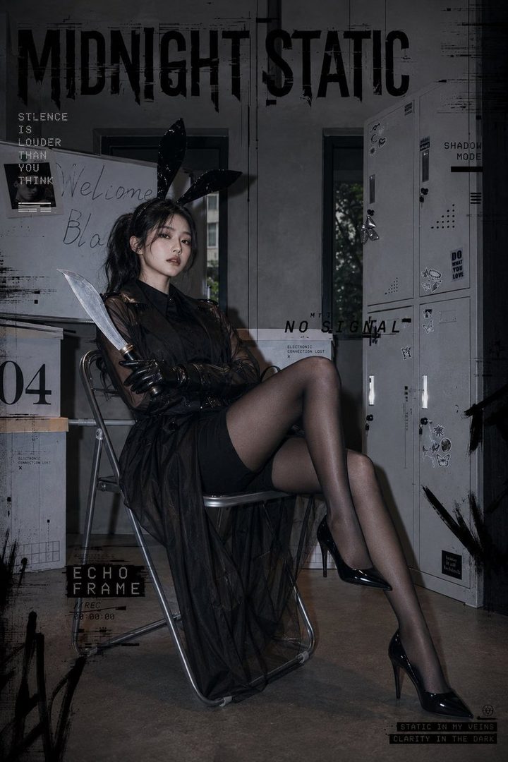 A woman with black hair and bunny ears, wearing a black sheer dress and stockings, sits holding a knife in a dark, stylized room with text overlays.