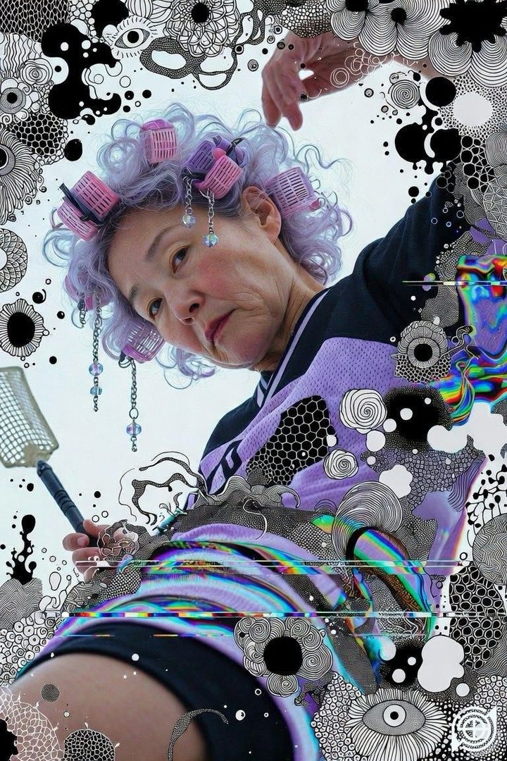 A woman with purple hair curlers and a purple and black top holds a fly swatter, surrounded by abstract black and white doodles.