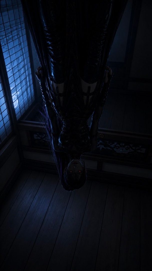 A dark fantasy portrait of a woman with long black hair, wearing a black dress, hanging upside down in a dimly lit room with blue light from a window.