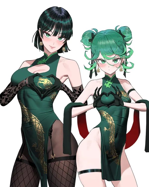 Two anime-style women in green cheongsam dresses with dragon patterns make heart gestures with their hands.