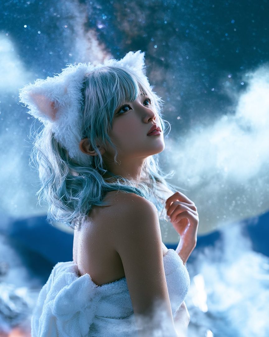 A woman with blue hair and cat ears looks up at a starry night sky while wrapped in a white towel, suggesting an outdoor bath scene.