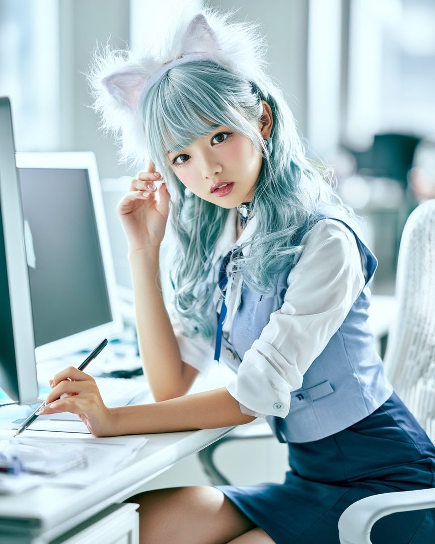 A cute AI-generated woman with blue hair and cat ears is working at an office desk, wearing a white blouse and blue vest.