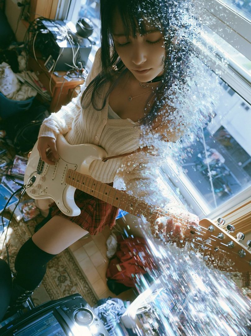 A young woman with black hair and bangs, wearing a white cardigan and a red plaid skirt, plays an electric guitar indoors with a dreamy, pixelated effect.