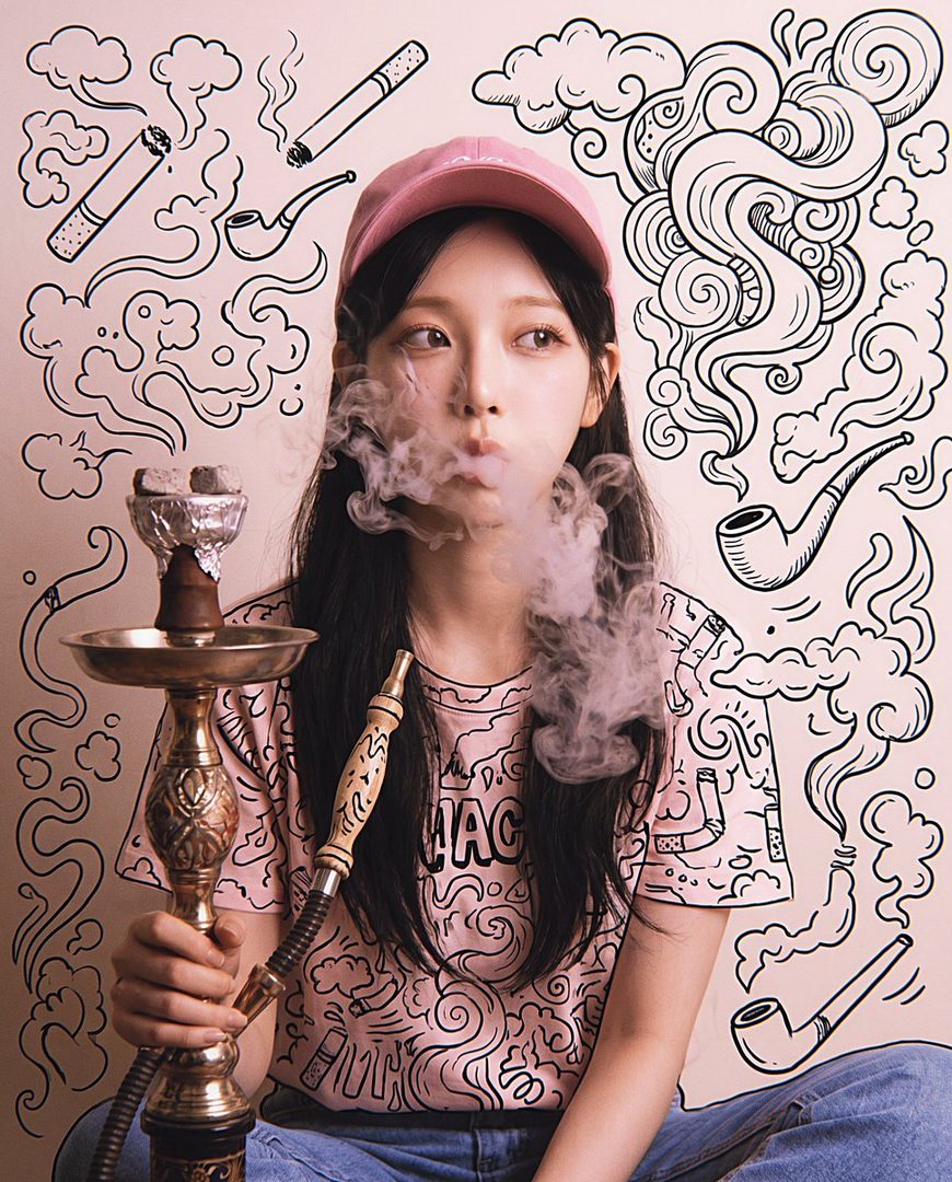 A young woman in a pink cap and t-shirt smokes from a hookah, with cartoon smoke and pipes drawn around her.