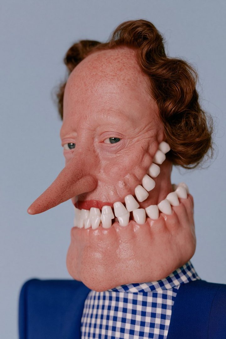 A surreal portrait of a person with an exaggerated nose and a jawline filled with teeth, wearing a blue and white checkered shirt.