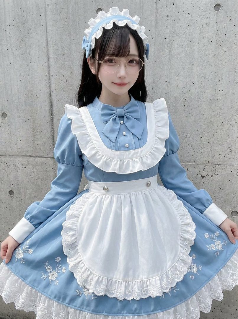A young woman in a blue and white maid outfit with a frilly apron and lace trim, wearing glasses.
